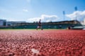 running track for athletic competition, training, exercise in stadium in summer Royalty Free Stock Photo