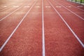 Running track with numbered lanes and crisp lines. Royalty Free Stock Photo