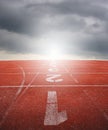 Running track one two three with raincloud Royalty Free Stock Photo