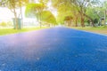 running track in runner rubber cover blue public park. for jogging exercise health lose weight concept copy space add