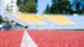 Running track in selective focus. finish line. health and sport. path for runners. racetrack on outdoor stadium. stadium Royalty Free Stock Photo