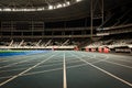 Running Track in a Stadium at Night Royalty Free Stock Photo