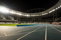 Running Track in a Stadium at Night Royalty Free Stock Photo