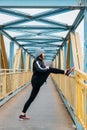 Running Warm Up, Warming Up Before Run, Prerun Warmup. Sporty woman stretching legs before jogging. Female Runner doing Royalty Free Stock Photo