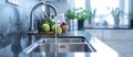 Running Water in Modern Kitchen Sink Royalty Free Stock Photo