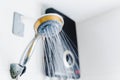 running water of shower faucet with electric water heater Royalty Free Stock Photo