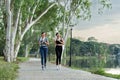 Running woman. Female Runner Jogging during Outdoor Workout in a Park. Healthy lifestyle. Morning Royalty Free Stock Photo