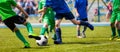 Running Young Soccer Football Players. Footballers Kicking Football Match Game Royalty Free Stock Photo