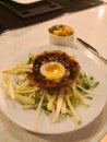 Scotch Egg on a bed of salad with piccalilli Royalty Free Stock Photo