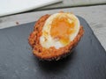 Runny scotch egg yum! Royalty Free Stock Photo