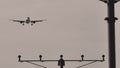 Silhouette of plane and airport runway lights Royalty Free Stock Photo