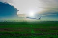 Runway, plane with evening sun