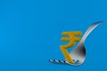 Rupee currency symbol with fork