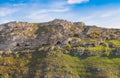 Rupestrian house and church, historic building. Sassi of Matera. Basilicata under blue sky Royalty Free Stock Photo