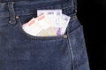 Rupiah money at jeans, at black background Royalty Free Stock Photo