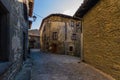 RUPIT, CATALONIA, SPAIN April 2016: A view of the medieval street with brutal rustic medieval houses
