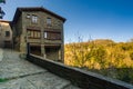 RUPIT, CATALONIA, SPAIN April 2016: view of the medieval town of Rupit- street with brutal rustic medieval house