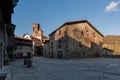 RUPIT, CATALONIA, SPAIN April 2016: A view of the medieval town of Rupit- Town Placa with Church Esglesia de Sant Andreu Rupit i