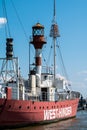 Ruppelmonde, Antwerp Province, Belgium - The West Hinder industrial ship with cranes at the harbor of the village