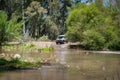 Rural Andalucia. Spain. 06/10/2016. 4x4 terrain vehicle approaching river in order to drive across.
