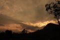 Beautiful natural scenery at sunset behind a hill.