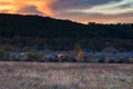 Rural background with countryside nature and houses in autumn evening Royalty Free Stock Photo