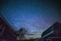 Rural barns at night with stars in winter Royalty Free Stock Photo