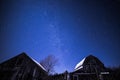 Rural barns at night with stars in winter Royalty Free Stock Photo