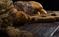 Rural bread and wheat on an old antique wooden table, still life Royalty Free Stock Photo