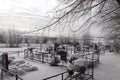 Village cemetery in the evening in winter, harsh climate