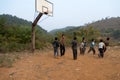 Rural children playing basketball Royalty Free Stock Photo