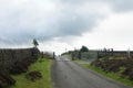 Rural country road with wooden gate in Yorkshire Royalty Free Stock Photo