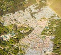 Rural development. Aerial view of a small urband development in the countryside. Royalty Free Stock Photo