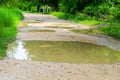 Rural dirt roads are flooded during the rainy season Royalty Free Stock Photo