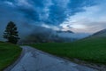 Rural empty road leading to Sorica village in Slovenia