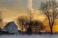 Rural Farm Buildings With Colorful Sunset