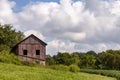 Old red barn on a hill Royalty Free Stock Photo