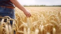 Rural farmer walking through field inspecting the wheat crop. created with Generative AI Royalty Free Stock Photo