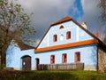 Rural farmhouse with blue facade. Vesely Kopec folk museum. Czech rural architecture. Vysocina, Czech Republic Royalty Free Stock Photo