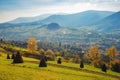 rural field with haystacks on the hill Royalty Free Stock Photo