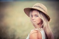 Rural girl in a straw hat