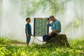 Rural girl teaching Thai language to foreign man