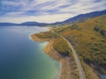 Rural highway along Tumut River coastline.