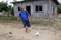 Rural Honduran Man playing Soccer