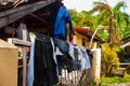 Rural house with many dried clothes in Apo island, Philippines