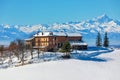 Rural house on snowy hill in Northern Italy. Royalty Free Stock Photo