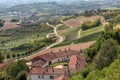 Rural house, vineyards and road in Italy.