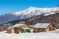 Rural houses and snowy mountains in Piedmont, Italy. Royalty Free Stock Photo