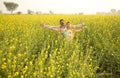 Rural Indian couple standing in agricultural field Royalty Free Stock Photo