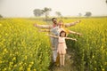 Rural Indian family in agricultural field Royalty Free Stock Photo